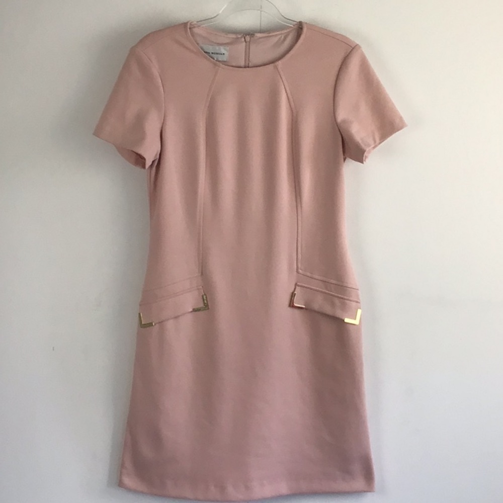 Barbie retro career dress by Donna Morgan. Pink of course. Stretch size 6